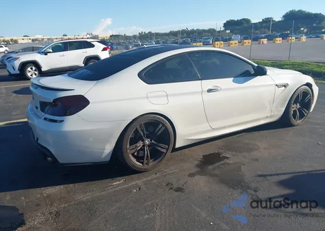 2016 BMW M6 z USA, uszkodzony, nr VIN WBS6J9C56GD934694